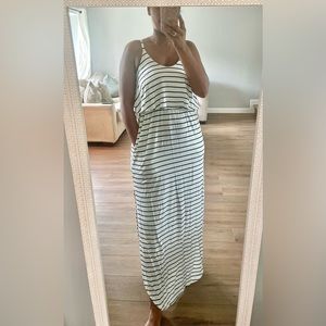 Stripe print jersey maxi dress, ruffled cami top and side slit details.